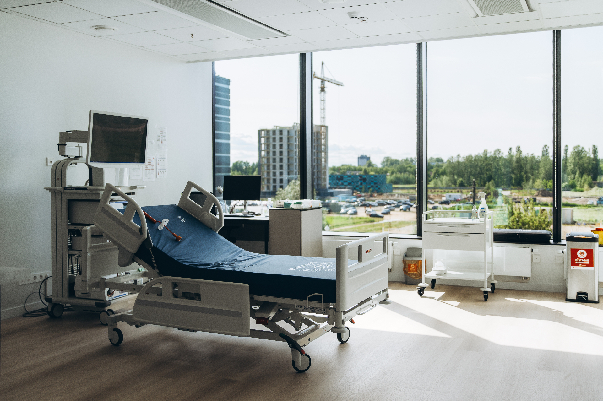Modern patient room with large windows at Dr. Feders Centre